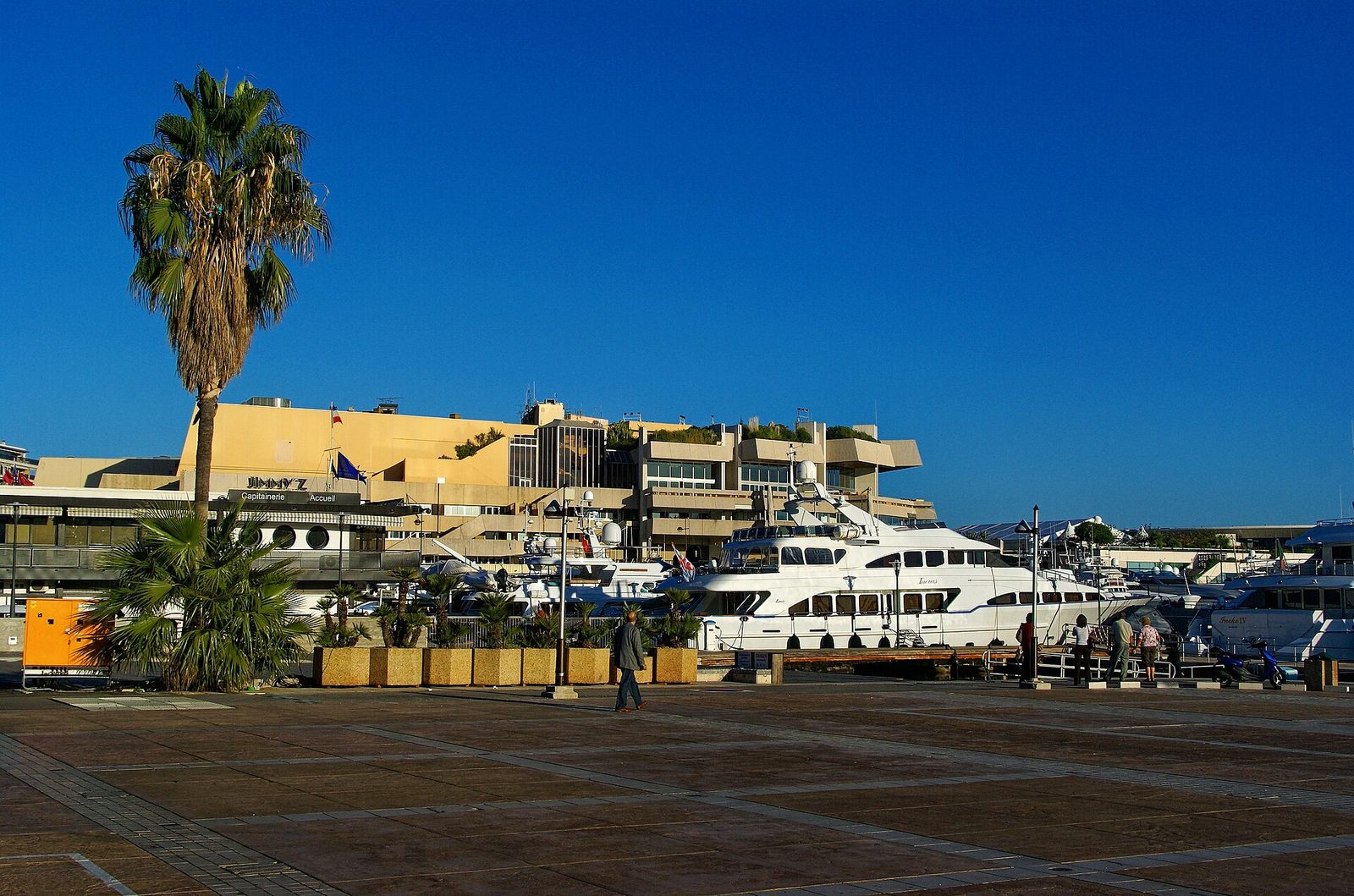 Palais des Festivals in Cannes seen across the nearby waterfront plaza